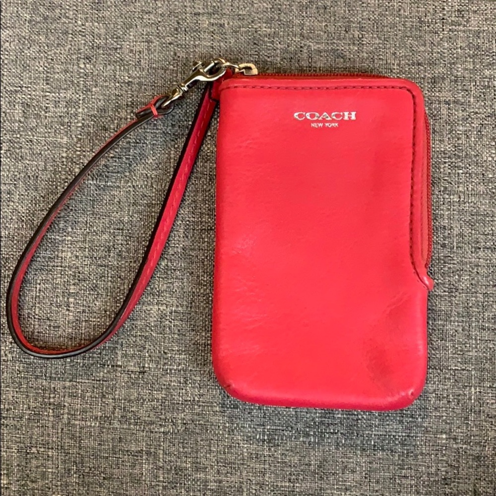 Pink coach wristlet.